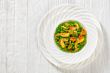 petits pois, french dish of garden green peas