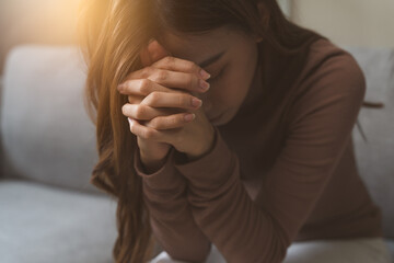 Christian woman praying for god blessing. - obrazy, fototapety, plakaty