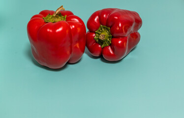 red sweet bell peppers from home garden. background with copyspace 