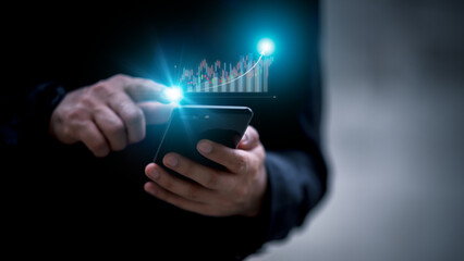 Business Analysis Concepts, Problem Solving and Planning Businessmen Financial Analysts working on digital tablet It is analyzing sales data and economic growth chart.