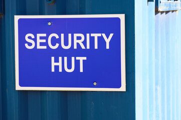 Security hut sign at construction site entrance