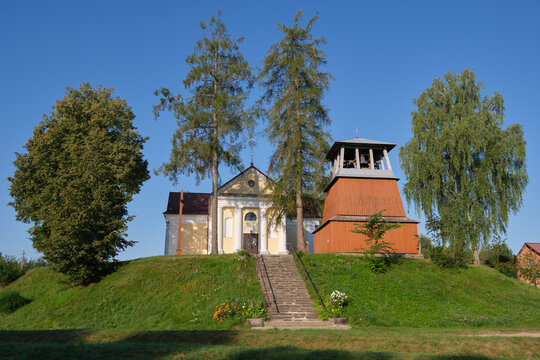Ancient catholic church of Our Lady of Perpetual Help and  belfry in Shemetovo village, Myadel district, Minsk region, Belarus.