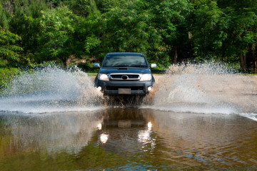 Fototapeta na wymiar Driving across a water dam on a test road