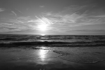 sunset at the north sea beach in Zandvoort monochrome - obrazy, fototapety, plakaty