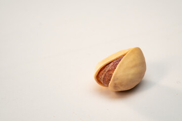 one pistachio on a white isolated background