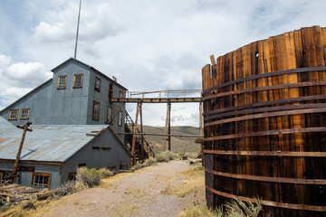 Fototapeta na wymiar The famous Bodie Ghost Town Looking at the Gold Quartz Stamp Mill and Water tanks