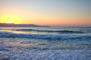 Beautiful sea and waves at sunset