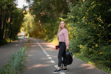 Woman online work outside. Laptop, computer business technology. Student girl working on tablet in summer nature park. People person outdoor. Escaped of office distance education concept