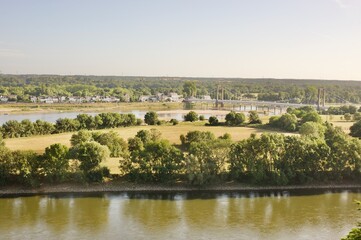 panorama on Loire river with bridge and village in summer time