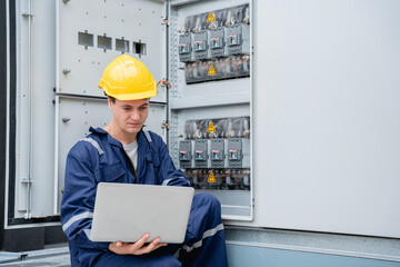 A team of engineers examined the electrical switchboard while checking the operational voltage...