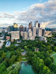 Vertical drone view of the Downtown Atlanta with modern buildings and a large green park, Georgia