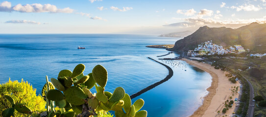 Amazing view of beach las Teresitas with yellow sand. Location: Santa Cruz de Tenerife, Tenerife, Canary Islands. Artistic picture. Beauty world. Panorama - obrazy, fototapety, plakaty
