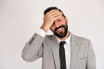 Portrait of startled bearded man. Male in suit gesturing with surprise. Portrait, emotion concept