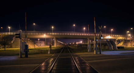 Fototapeta na wymiar Bridge over the Railway Track at Night