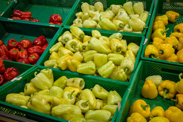 fresh bell peppers on the counter vegetables in the supermarket