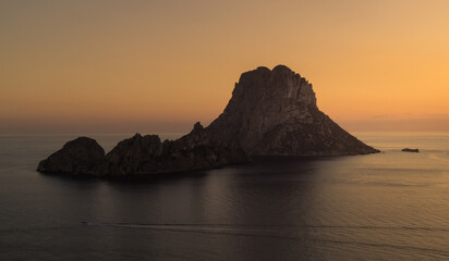 Sunset off the island of Es Vedra in Ibiza (Spain).