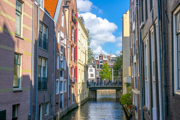 Fototapeta na wymiar Sunny Day in Amsterdam and Canal Houses