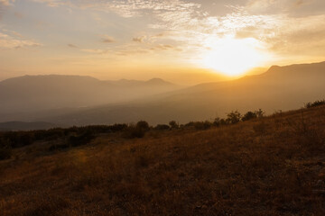Fototapeta na wymiar Sunset near Demerdzhi rocks. Crimea