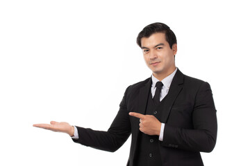 Businessman smiling, holding open palm with empty copy space. Business man showing hand sign to side concept of advertisement product isolated on white background.