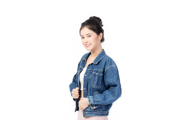 Portrait of beautiful asian woman model in white T-shirt, dressed in denim jacket posing while standing and looking at camera isolated on white background.