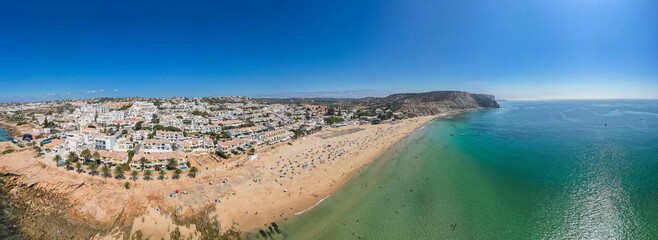 Praia Dona Ana beach with turquoise sea water and cliffs, Portugal. Beautiful Dona Ana Beach (Praia...