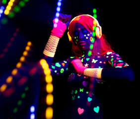 Female dancer in glow UV costume