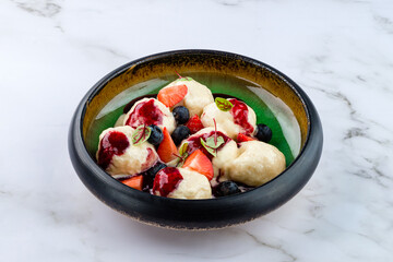 dumplings with strawberries and berries