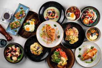 collection of breakfast dishes, a set table top view of a large set lunch