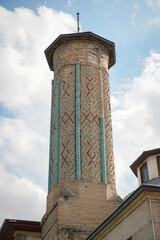 Fototapeta na wymiar Minaret of Ince Minaret Medrese as Museum of Stone and Wood Art in Konya, Turkiye