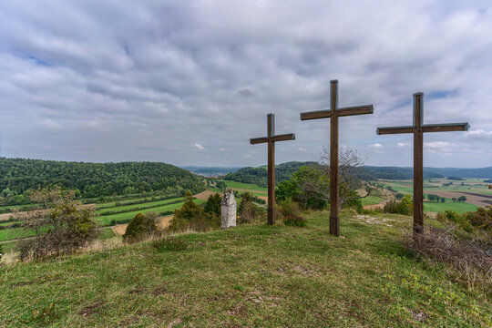Three crosses on the top of a hill in the swabian alps, Germany