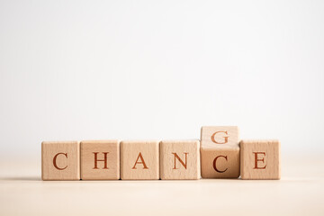 Wooden cube with word change to chance, Personal development and career growth or change yourself concept.