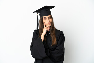 Young university graduate isolated on white background thinking an idea