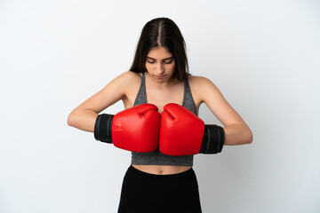 Young caucasian woman isolated on white background with boxing gloves