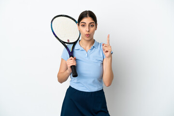 Handsome young tennis player caucasian woman isolated on white background intending to realizes the solution while lifting a finger up