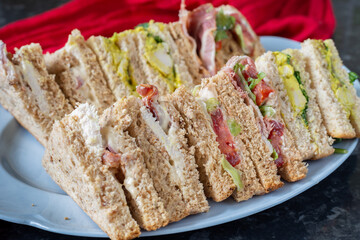 Selection of sandwiches with different fillings on a plate