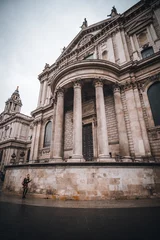 Foto op Plexiglas St. Pauls Cathedral and red bus in London © Dominik