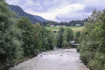 Fototapeta premium View of Enns river flowing through the town of Schladming, Styria, Austria