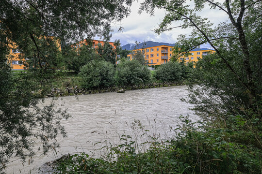 View of Enns river flowing through the town of Schladming, Styria, Austria