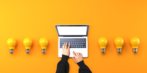 Person using a laptop computer with light bulbs from above - obrazy, fototapety, plakaty