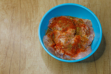 raw meat with spices in a bowl