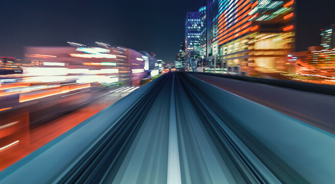 Abstract high speed technology POV train motion blurred concept from the Yuikamome monorail in Tokyo, Japan