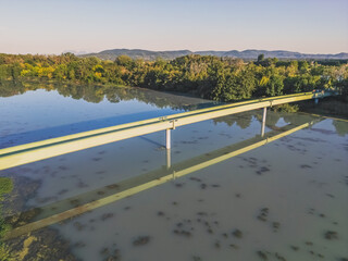 Pedestrian bridge over the Drôme river at Le Pouzin - a tributary of the largest river in France - the Rhône