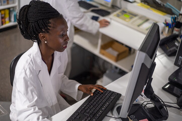 Young medical officer working on her computer