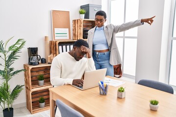 Man and woman business workers with problem at office