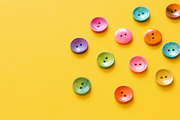 Colorful button on yellow background