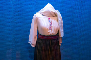 Traditional Romanian clothing embroidered with colored women’s in men's shirts of embroidered shirt.