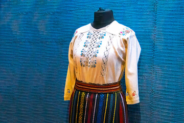 Traditional Romanian clothing embroidered with colored women’s in men's shirts of embroidered shirt.