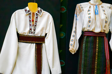 Traditional Romanian clothing embroidered with colored women’s in men's shirts of embroidered shirt.