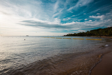 Beautiful tropical sea at vietnam with a ship in the background