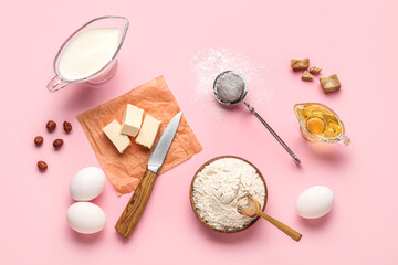 Composition with different ingredients for baking on pink background